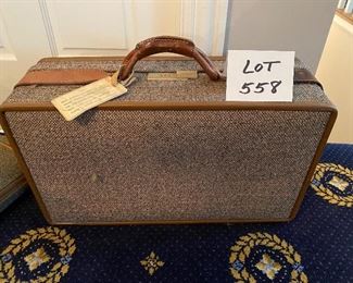 Lot 558. $225.00.  Suitcase