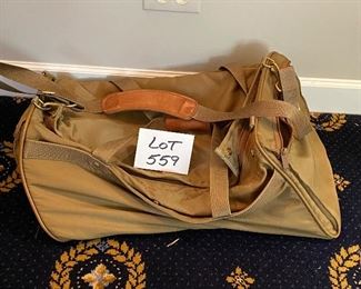 Lot 559.  $45.00  Hartman Khaki nylon duffle bag with leather trim.  Very useful for that overnight or weekend Getaway trip to the Lake. 