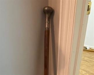 Lot 563. $30.00   Walking Stick, with embossed knob handle. 38" L. 