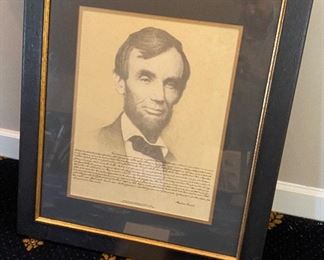 Lot 564. $55.00  Framed, Pen and Ink of Abraham Lincoln with the text of the Gettysburg address. 24"x20.5".