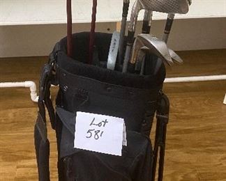Lot 581. $95.00. Tour Edge golf bag with VWing #5 and Vulcan wood Cobra graphite irons 3,4,6,8,9,PW and 55 degree wedge.  