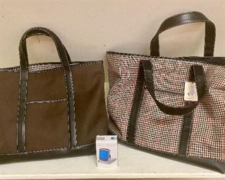 Lot 583. $48.00. Two Baekgaard Weekend totes one NWT 16"x13" and 22"wx14"t and Brookstone travel clock.  Baekgaard totes and handbags can be expensive!  This is a great deal!