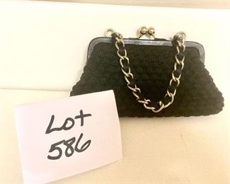 Lot 586. $12.00.  The Sac cloth Evening bag with chain strap