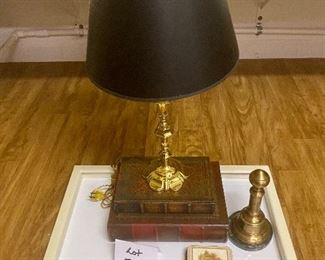 Lot 589. $30.00   Office Decor: 2 faux books that are boxes, brass chess piece paperweight (we had a few of these last week too!), and brass desk lamp, beverage coasters.