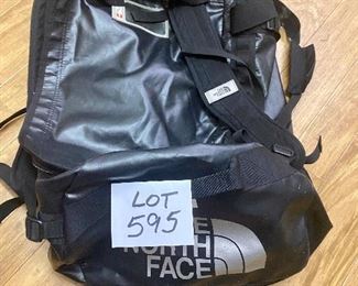 Lot 595. $48.00  North Face Large Base Camp duffel bag, 28" wide.  The luggage equivalent of a Timex...takes a lickin' and keeps on kickin'.  Retails of $100.00