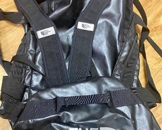 Lot 595. $48.00   North Face duffle bag, 28" wide
