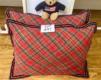 Lot 597. $48.00.  2 Ralph Lauren stand pillows in red, Scottish plaid.  plus Ralph Lauren Teddy Bear wearing navy American Flag  Sweater.  Apparently this Teddy is actually collectible.  