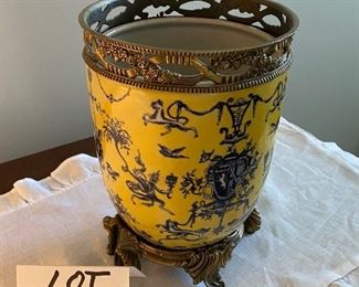 Lot 611. $20.00. Painted porcelain planter with brass accents on the rim and footed brass stand