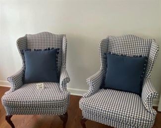 Lot 700. $550 for the pair.  2 Blue and White Gingham Wingback Chairs with 2 Pottery Barn Pillows. 30"W x 43"T 20" Seat Height