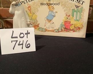 Lot 746. $25.00.  Peter Rabbit Nursery set by Wedgewood- plate, bowl & mug and a Lladro wannabee!