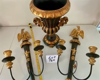 Lot 764.  $350/pair. Pair of vintage (1980s?) Black and Gold Italian wall candle sconces with a regal eagle sitting on top. The internet has "sold" a pair of these exact sconces for $1,150 on Chairish. These are in good shape and are very delicate, some small signs of use, but better than good condition otherwise. This lot also includes a Black and Gold urn.  Candlesticks measure 26" tall.   urn:26" tall by 10"