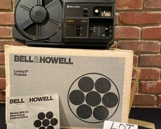 Lot 756. $40.00. Bell & Howell  Model MX33 Lumina II, Projector w/box and instructions