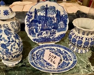 Lot 786.  $35.00.  Blue and White decorative items: 12" covered ginger jar, 10" tall egg-shaped decor, 11.5" oval handled tray, 12" and platter, and 8" tall by 8" diameter blue spongeware vase.