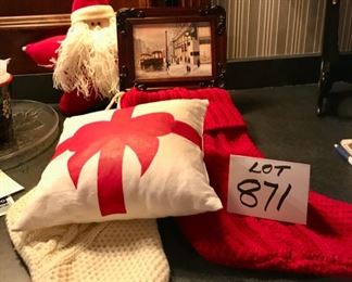 Lot 871. $45.00.  A Marshall Field Christmas: 5" x 7" Framed and Signed Giclee of Marshall Fields, 2 Knit Christmas Stockings, 1 Star Shaped Santa Pillow 