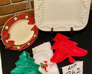 Lot 862.  $24.  Miscellaneous Christmas Lot includes Green and Red ceramic christmas tree Candy Dishes, one Red plaid rim plate and a really nice large white rectangular platter, and a tea towel 