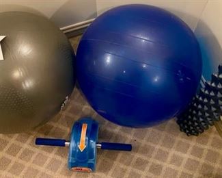 Lot 868.  $30.00.  Set of 2 exercise balls, one roller, one ab roller