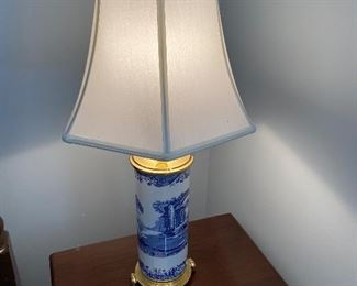 Lot 612. $90.  Two beautiful porcelain and brass table lamps, made in England