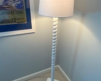 Lot 610.  $85.00. Pottery Barn white floor lamp with turned Wood pole.  Like New Condition