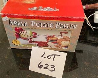 Lot 623. $12.00.  Peel Away apple & potato peeler in box. Make some apple crisp and bring us some, loll!   