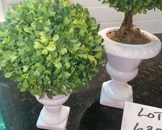 Lot 632. $50.  Artificial two tall topiaries 24" tall; two smaller topiaries 10" 