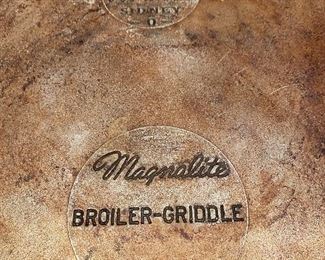 Lot 644. #18 One Vintage Magnalite Pan - very well used and needs to meet a Brillo Pad.  Also one Wagner Ware Sydney griddle pan - the same condition, however, these are workhorse pans & collectible.