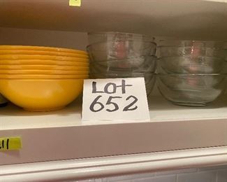 Lot 652.  $24.00. 9 Clear Salad or Cereal Glass Bowls and 8 Crate & Barrel Yellow Plastic Bowls - Nice Lot