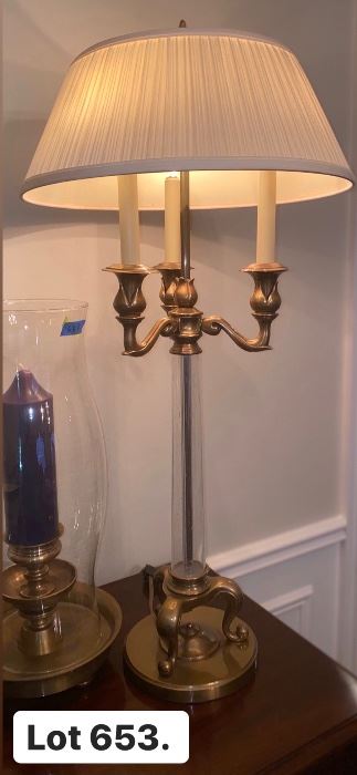 Lot 653. $225.  Chapman Table Lamp with clear stand and brass base.  1986. 