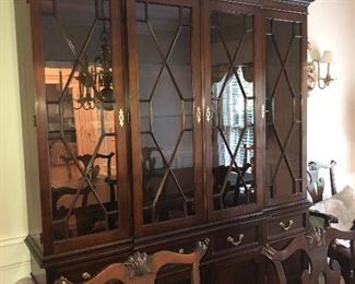Lot 500. $3,200. China  Cabinet with lighted cabinet 94" Tall by 72" L by 17" deep. 