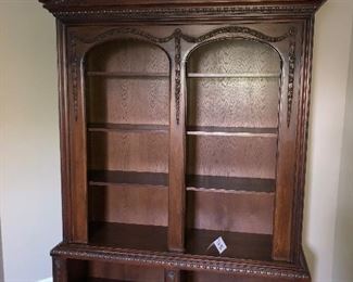 Lot 604 $750.00 Double arched, 2 pc Oak bookcase, walnut stain.  87"T x 62"W x 20"D.  This is one impressive Bookcase, perfect for your Law Library.  It has that Empire look and very well detailed.  It will need to be professionally Moved from the 3rd Floor.