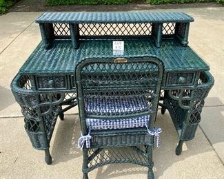 Lot 45 $250.00  Smithsonian Wicker Desk & Chair Set in a Deep Green - desk 53"w x 23" deep x 30.5" tall. Chair 36" to top of chair, 17.5"