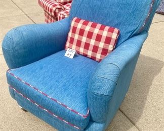 Lot 47  $100.00. Chambray Denim Armchair with red plaid pillow and piping.  31" w. x 38" deep x 35" tall Goes well with the Red Gingham Loveseat!  
