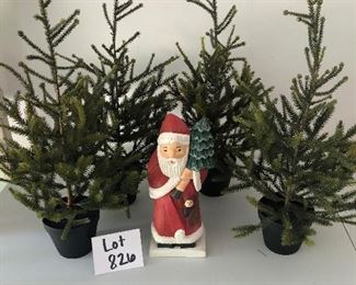 Lot 826. $28.00. 4 Christmas trees (23" tall), 1 wooden Santa by Silvestri (12"tall)