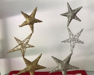 Lot 857.  $28.00.  Sweet Gold and silver stacking stars. 31" tall. These would be great centerpieces for Christmas, New Years, 4th of July! 