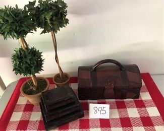 Lot 895. $85. Leather Chest w/Handles, "Book" 3 Hidden drawers. Costly chest orig, price $280, paid $139.00 on sale, 13.5""x9-1/2" to top of handle, 7" deep. 2 topiaries (21"high), topiary have terra cotta pots (heavy)Sweet Lot. 
