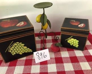 Lot 896.  $40.  Two cute wooden hand-painted boxes, one larger and one a bit smaller, painted on all sides and the boxes do open to hide all your stash  and one metal "fruit" candlestick featuring lemons and leaves.  