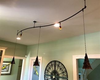 Pendant hanging track light w/ tortoise colored glass shades