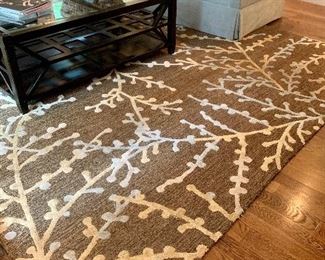 Item 6:  Brown rug with a blue & cream branch design - 115" x 163":  $900