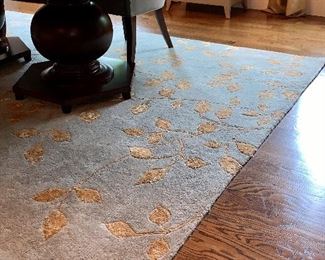 Item 36:  Blue rug with cream leaf design - 94.5" x 132": $545