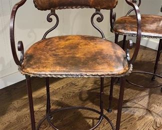 Item 74:  (3) Arhaus Cafe Swivel Counter Stool- Hand forged wrought iron frame with "rust coffee" leather and thick stitching:  - 19" x 18" x 40": $300 ea
