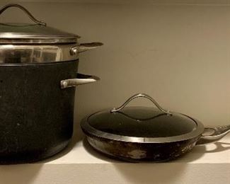 Lot of assorted well-loved Calphalon  pans - fry pan with lid and Stock Pot with Strainer and Lid: $28