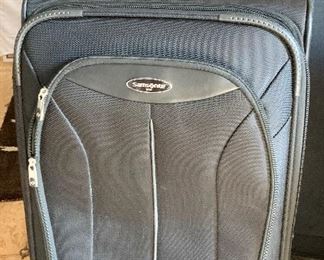 Item 157:  Samsonite carry-on suitcase (We have 3!) - 14" x 8.5" x 24"