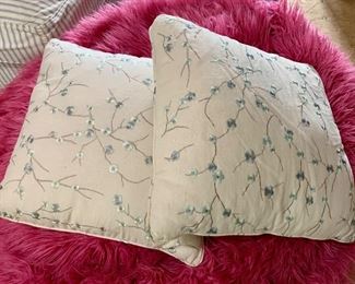 Two ivory pillows with blue flowers: $14