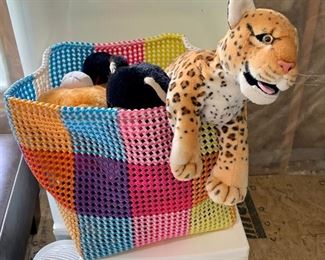 Lot of assorted stuffed animals in cool bendy basket: $10