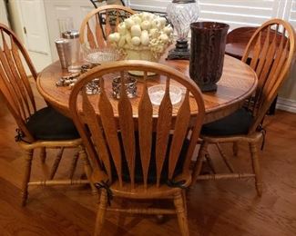 Oak Table and 6 Chairs- Leaf Makes it a Oval Table