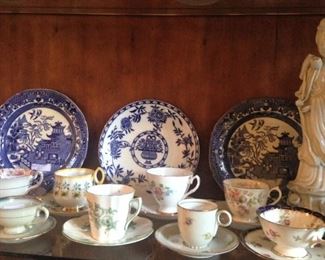 Some of the several cups & saucers AND blue & white plates