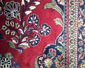 Fabulous 8 feet x 11 feet rug with reds, blues, and greens