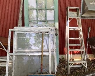 Old doors and windows, another aluminum ladder