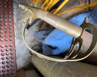 Brass horse head handle on sword