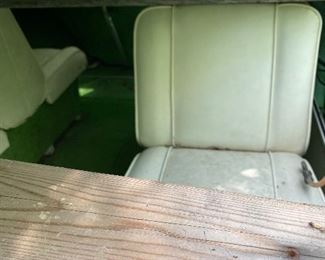 PRE-SALE ITEM: Homemade wood frame to hold boat cover. Four seats. Super fun avocado green carpet!