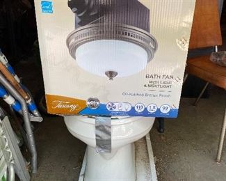 Toilet; bath fan with light